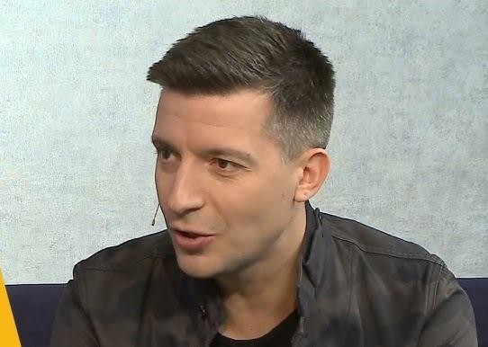 Michał Cessanis w trakcie podróżniczej przygody, prezentujący pasję do odkrywania świata.
