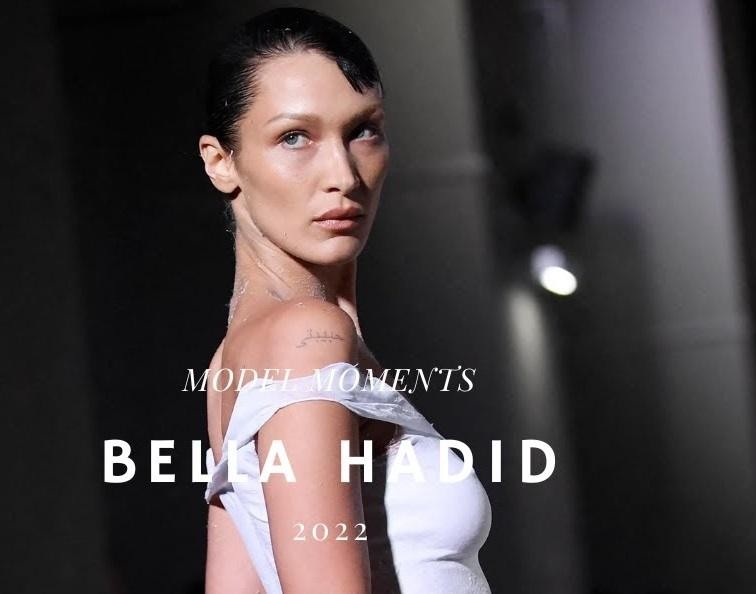 Bella Hadid w eleganckim stroju jeździeckim, w harmonii z koniem, podczas sesji zdjęciowej podkreślającej jej pasję do jeździectwa.